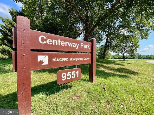9012 Centerway Road Gaithersburg, MD 20879 - Photo 23 of 32 a view of a sign that is sitting in the grass