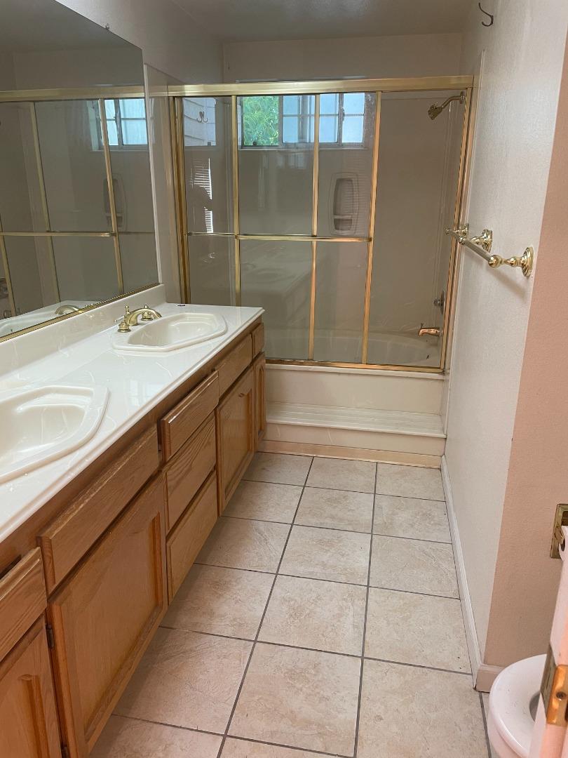 2294 Pinard Street Milpitas, CA 95035 - Photo 12 of 21 a bathroom with a sink a toilet and shower