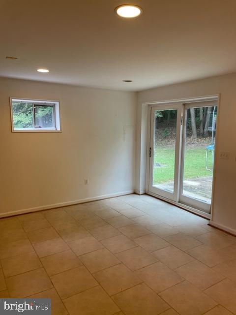 6540 Running Brook Road Manassas, VA 20112 - Photo 3 of 11 a view of an empty room with a window
