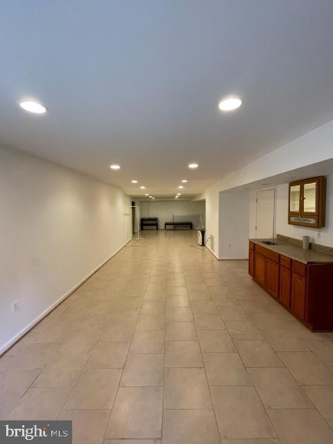 6540 Running Brook Road Manassas, VA 20112 - Photo 8 of 11 a view of an empty room with a sink