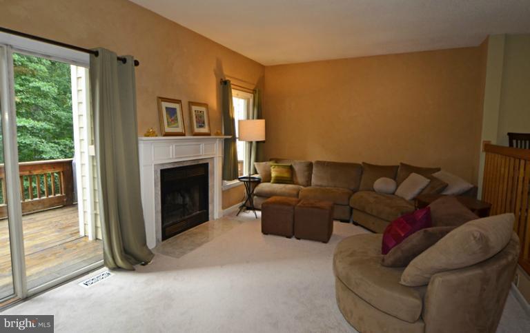 1616 Oak Spring Way Reston, VA 20190 - Photo 29 of 30 Living Room with fireplace