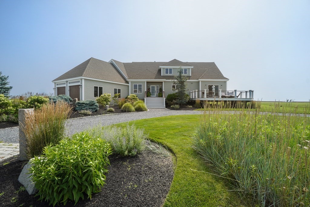 123 Gurnet Road Duxbury, MA 02332 - Photo 1 of 42 a front view of a house with a yard