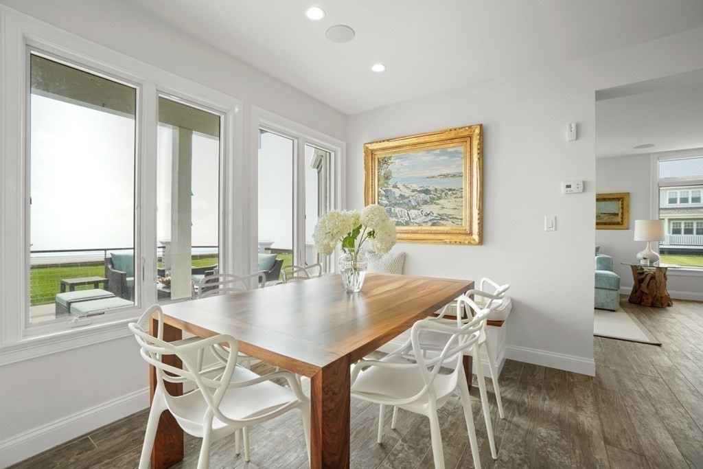 123 Gurnet Road Duxbury, MA 02332 - Photo 12 of 42 a view of a dining room with furniture and a potted plant