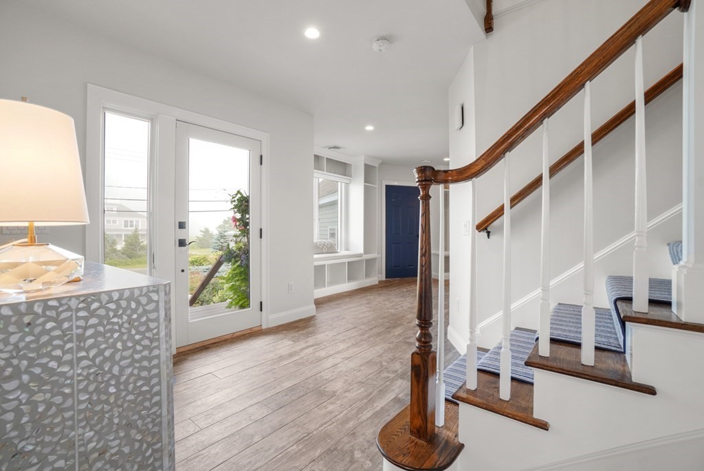 123 Gurnet Road Duxbury, MA 02332 - Photo 15 of 42 a view of entryway with wooden floor and windows