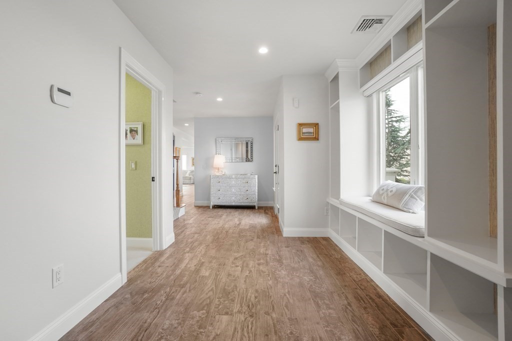 123 Gurnet Road Duxbury, MA 02332 - Photo 17 of 42 a view of hallway with wooden floor and a window