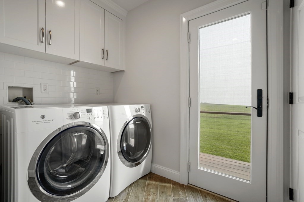 123 Gurnet Road Duxbury, MA 02332 - Photo 19 of 42 a view of a hallway with washer and dryer