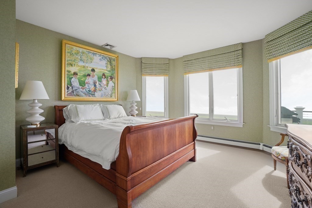 123 Gurnet Road Duxbury, MA 02332 - Photo 21 of 42 a spacious bedroom with a bed and a window