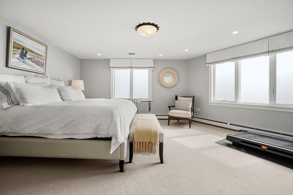 123 Gurnet Road Duxbury, MA 02332 - Photo 26 of 42 a spacious bedroom with a bed and a window
