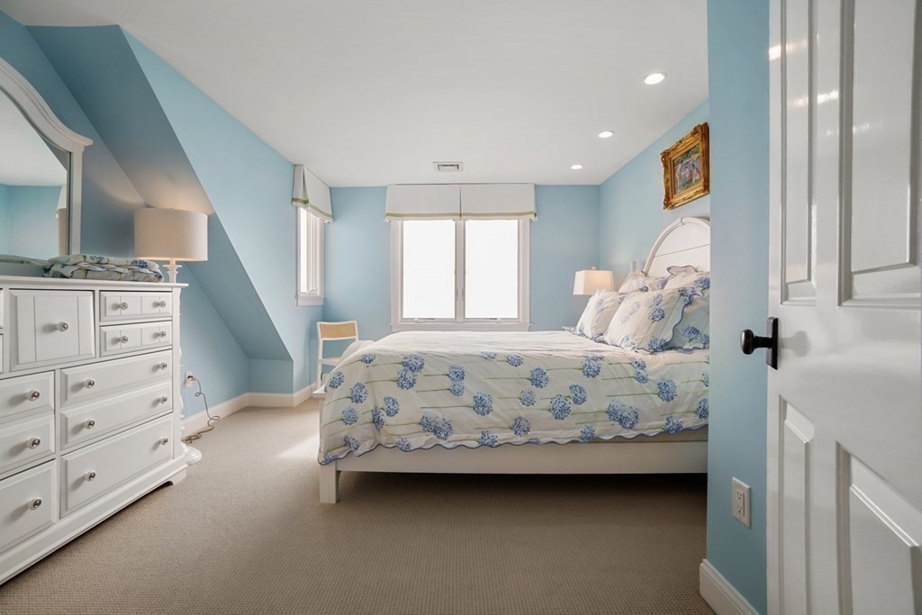 123 Gurnet Road Duxbury, MA 02332 - Photo 27 of 42 a bedroom with a bed and a window