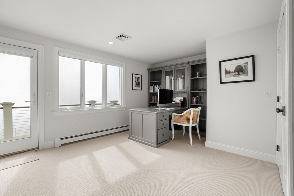123 Gurnet Road Duxbury, MA 02332 - Photo 32 of 42 a view of a workspace with furniture and a window