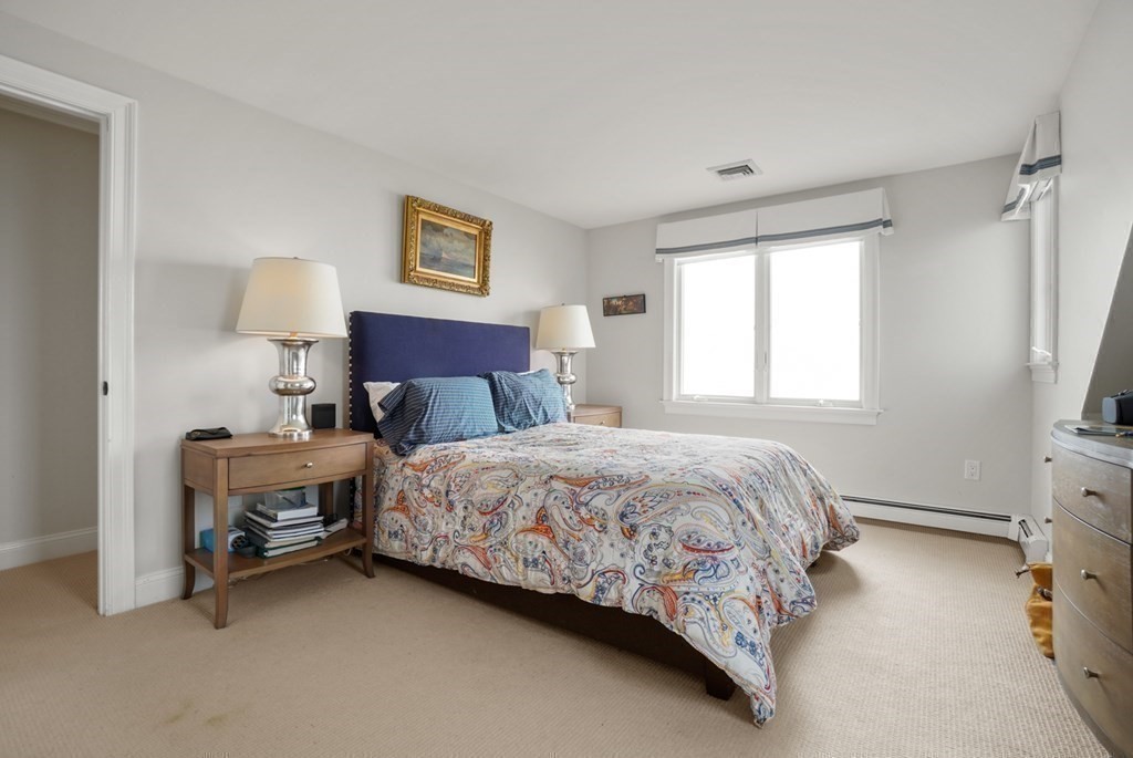 123 Gurnet Road Duxbury, MA 02332 - Photo 35 of 42 a bedroom with a bed and a window