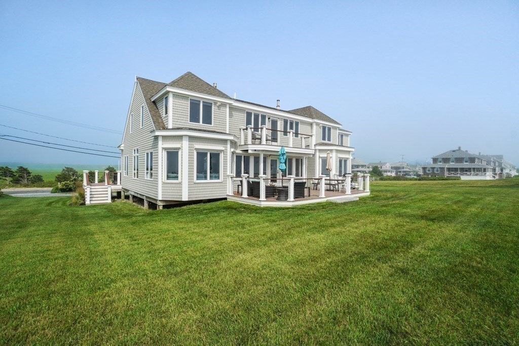 123 Gurnet Road Duxbury, MA 02332 - Photo 38 of 42 a front view of a house with a garden
