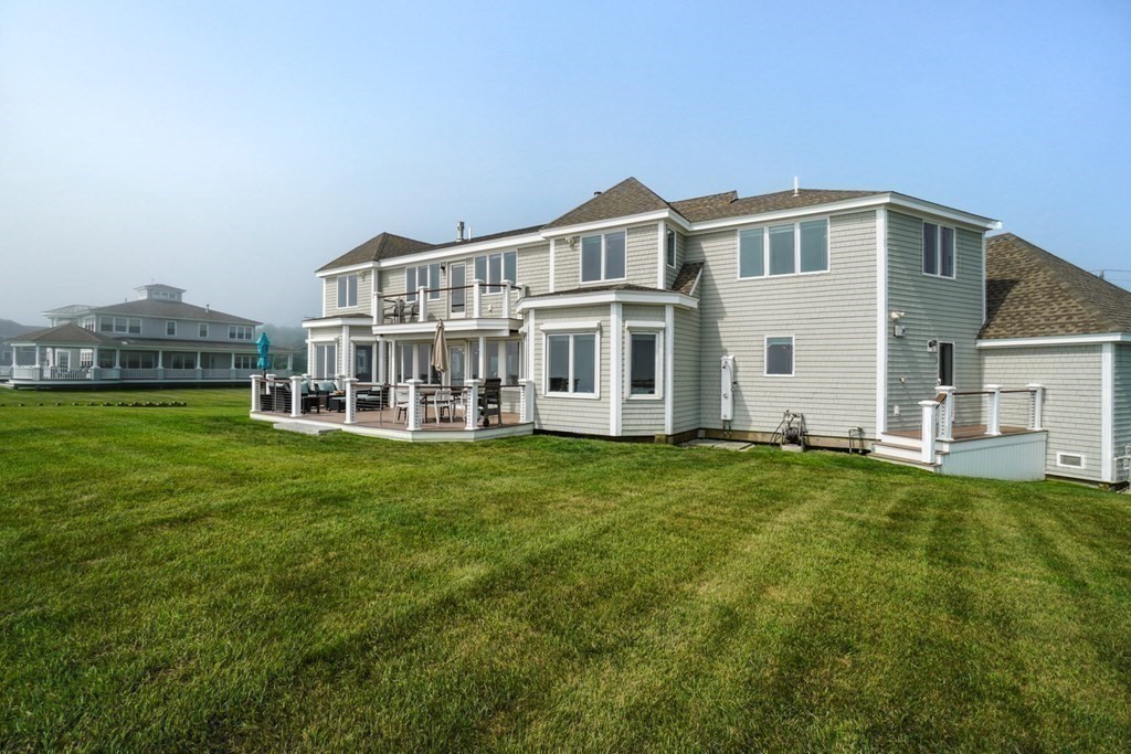 123 Gurnet Road Duxbury, MA 02332 - Photo 40 of 42 a view of a house with a backyard