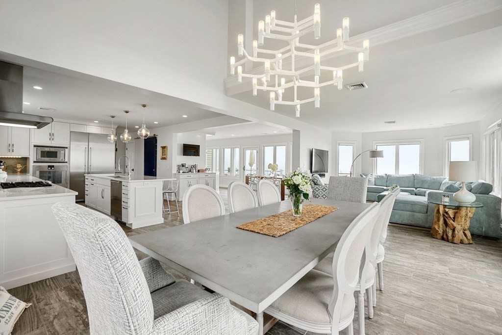 123 Gurnet Road Duxbury, MA 02332 - Photo 5 of 42 a view of a dining room with furniture and wooden floor