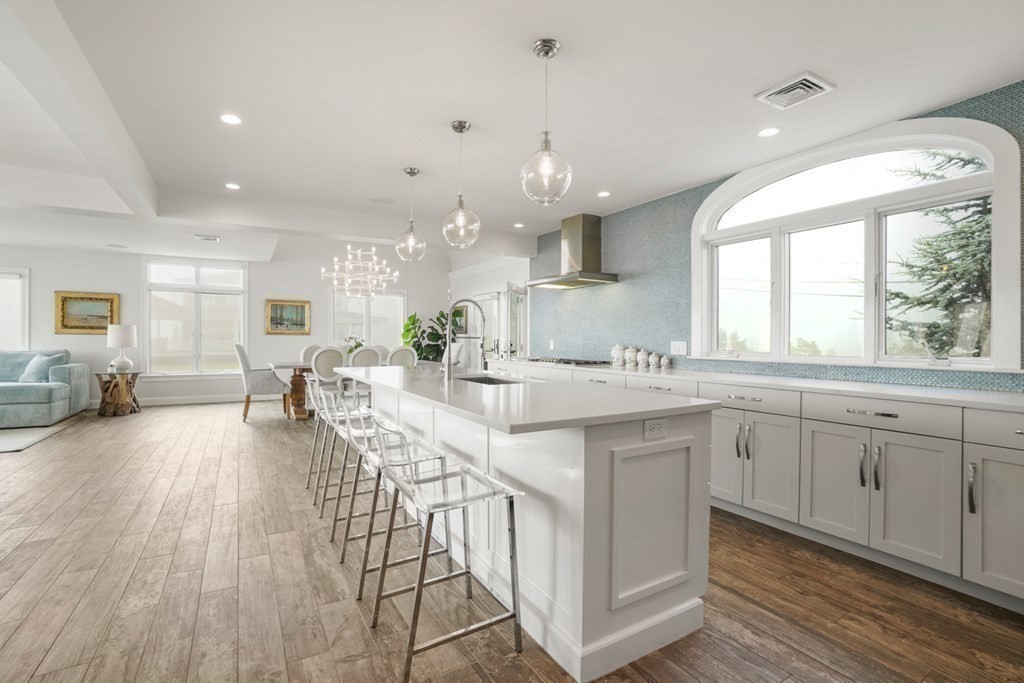 123 Gurnet Road Duxbury, MA 02332 - Photo 6 of 42 a large kitchen with cabinets