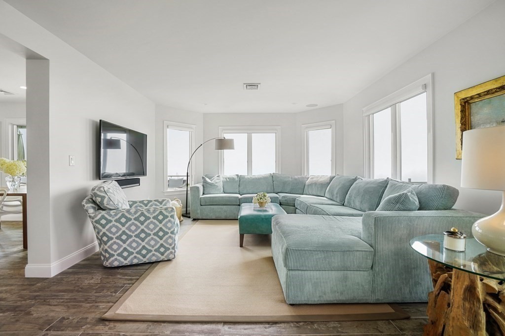 123 Gurnet Road Duxbury, MA 02332 - Photo 8 of 42 a living room with furniture and a couch