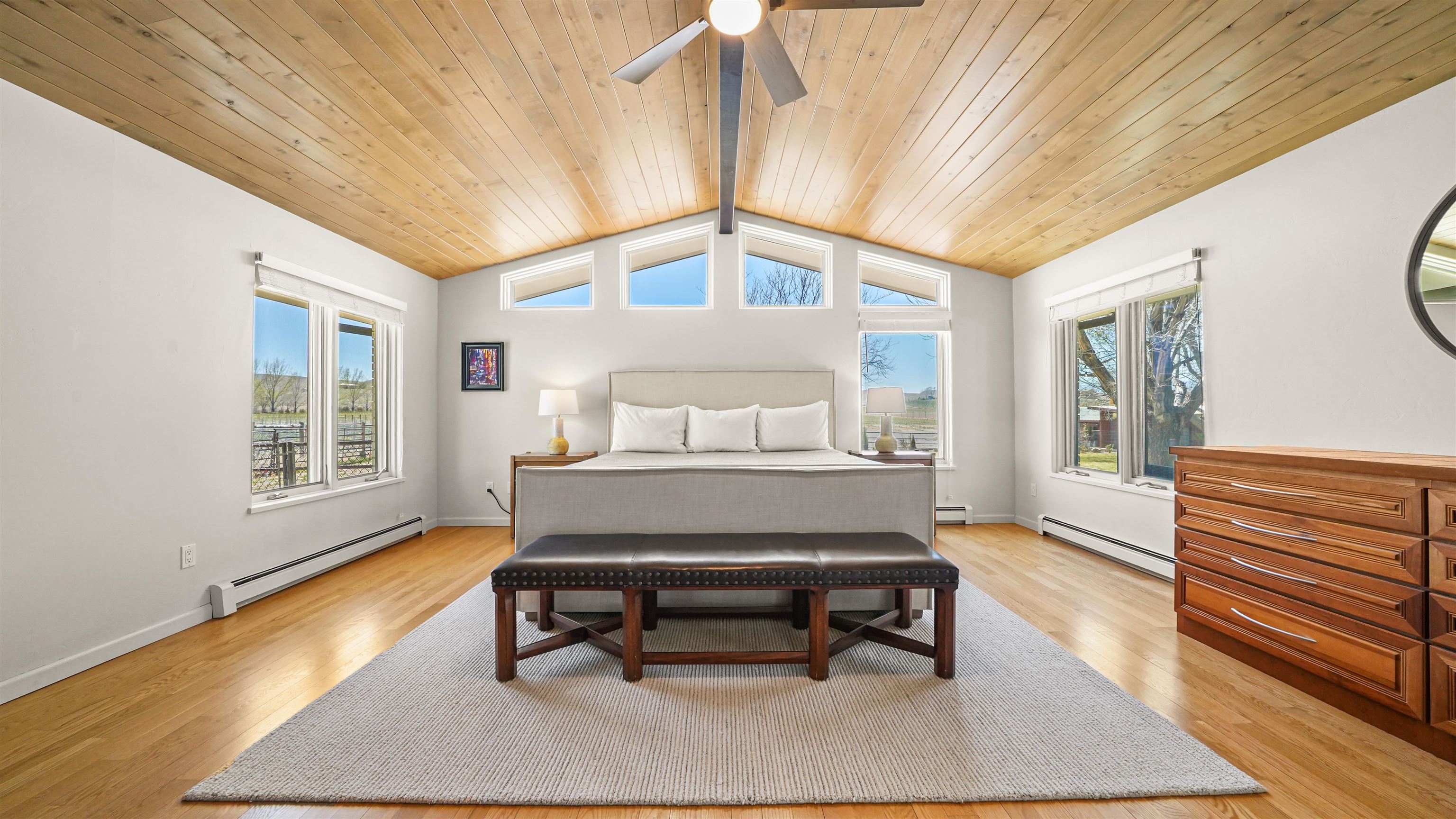 3339 C Road Palisade, CO 81526 - Photo 15 of 39 a living room with a bed furniture and a window