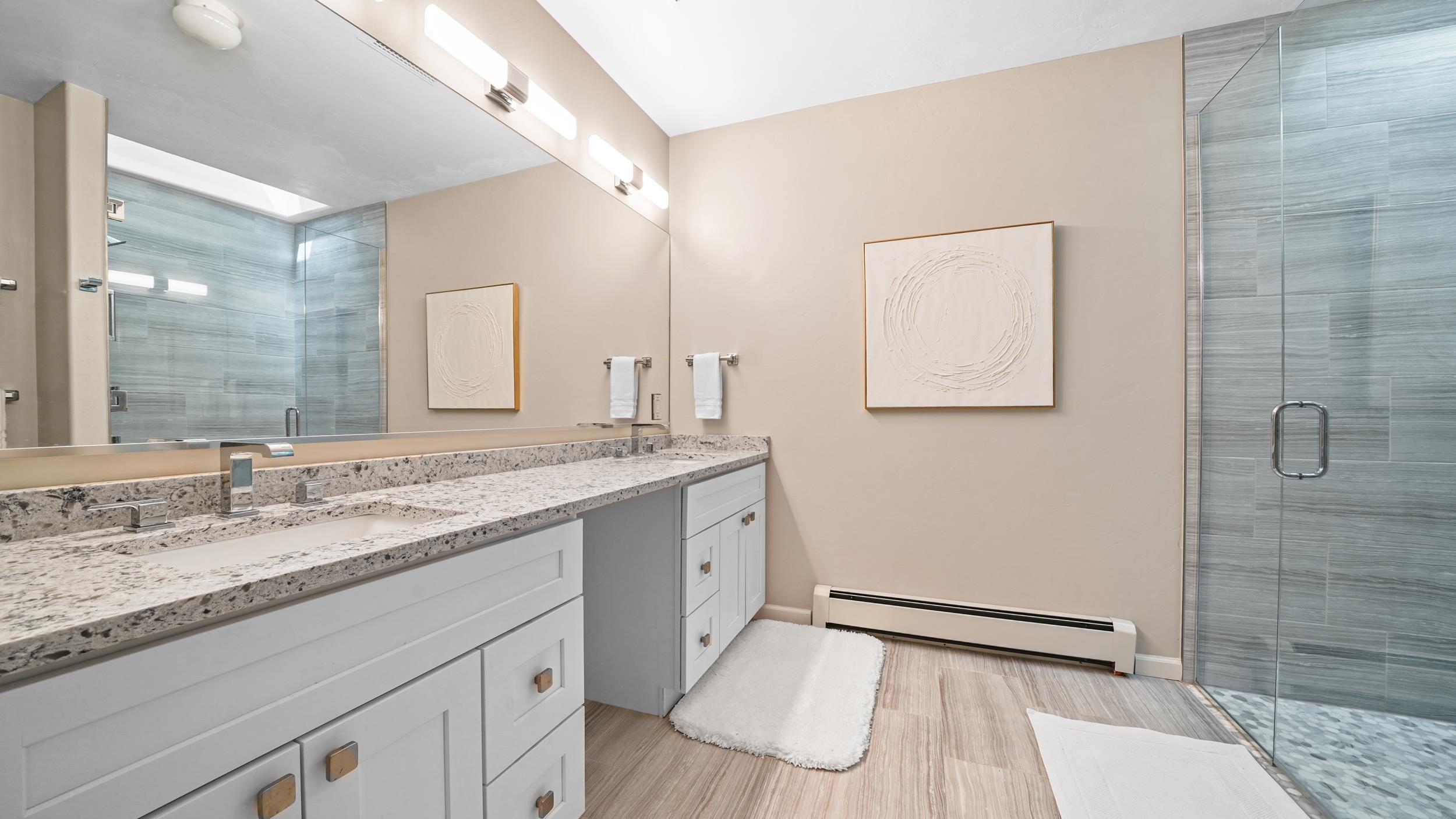 3339 C Road Palisade, CO 81526 - Photo 23 of 39 a bathroom with a granite countertop sink mirror and double