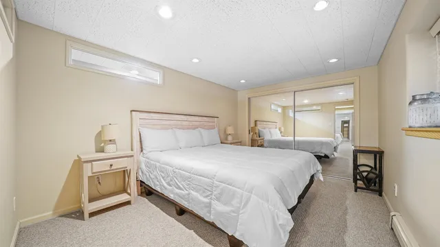 a bedroom with a bed and a cabinets