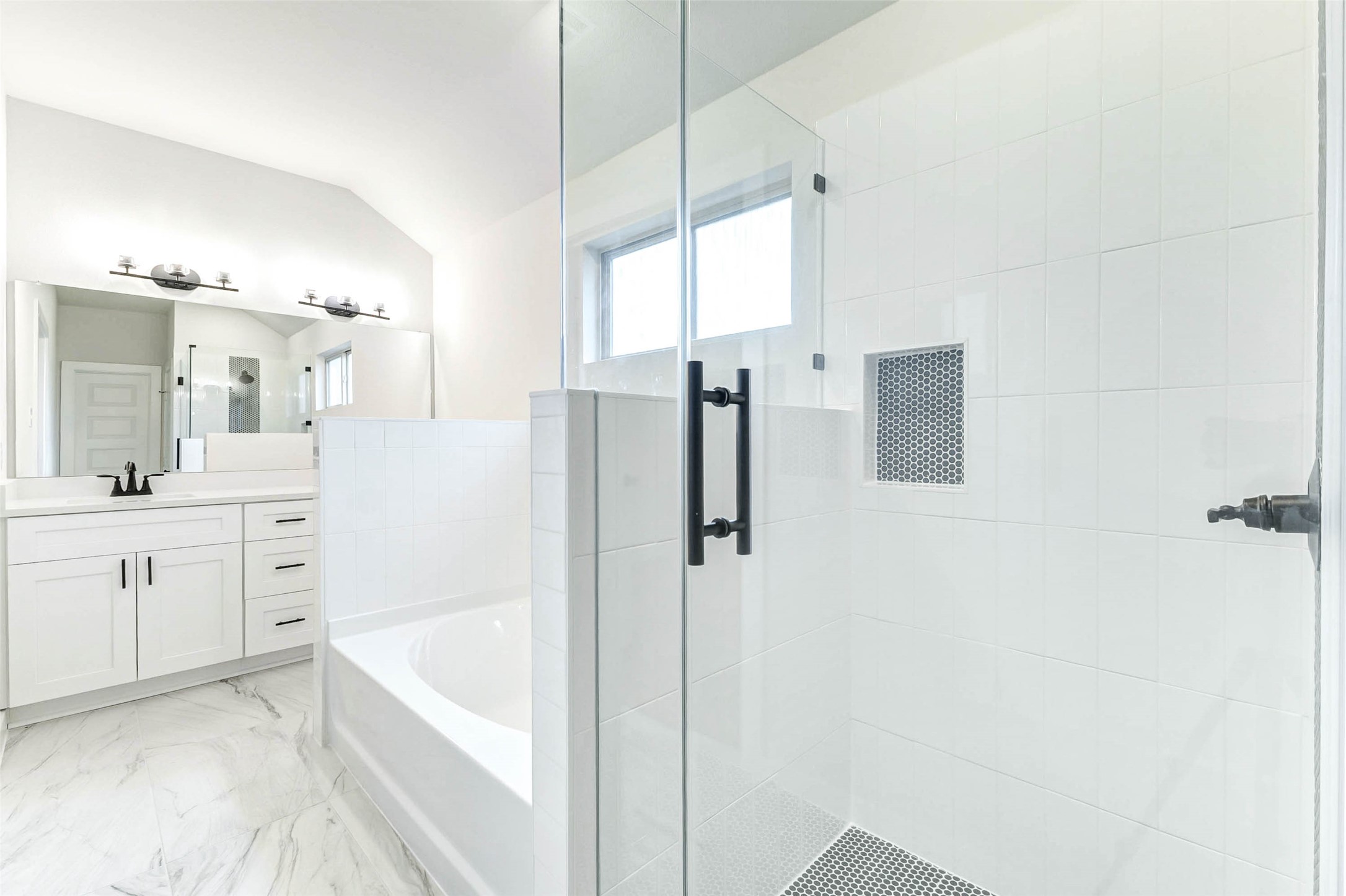 6422 Pomona Court Rosharon, TX 77583 - Photo 13 of 24 a bathroom with a tub sink and mirror