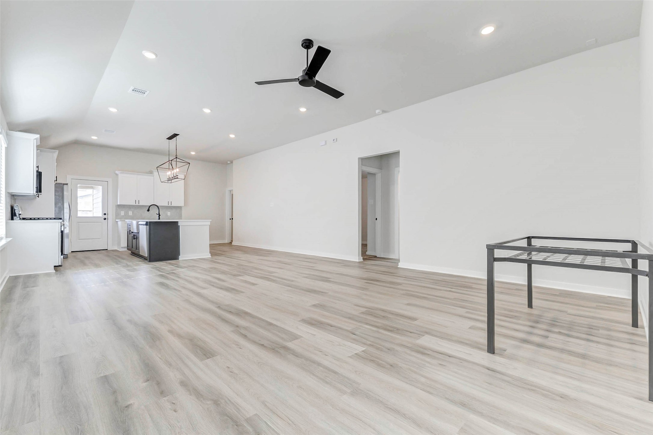 6422 Pomona Court Rosharon, TX 77583 - Photo 4 of 24 a view of empty room with wooden floor and windows