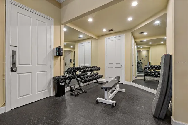 a view of a room with gym equipment