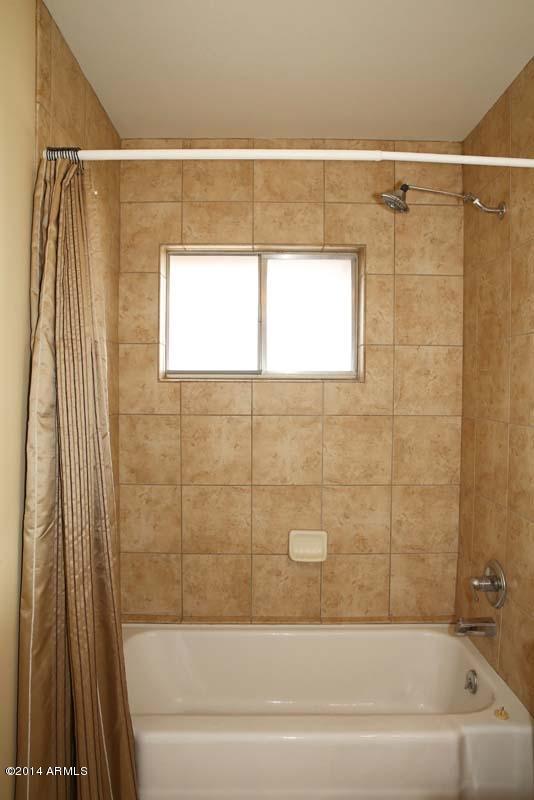 8213 East Chaparral Road Scottsdale, AZ 85250 - Photo 27 of 30 Hall Bath-Tub