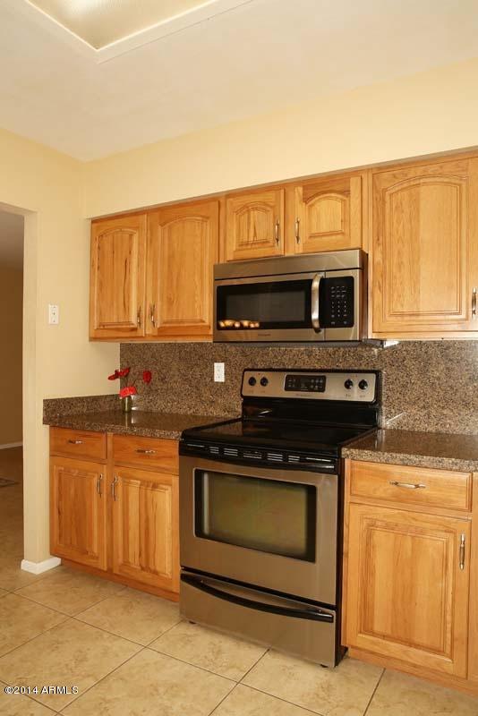 8213 East Chaparral Road Scottsdale, AZ 85250 - Photo 7 of 30 Kitchen-Range