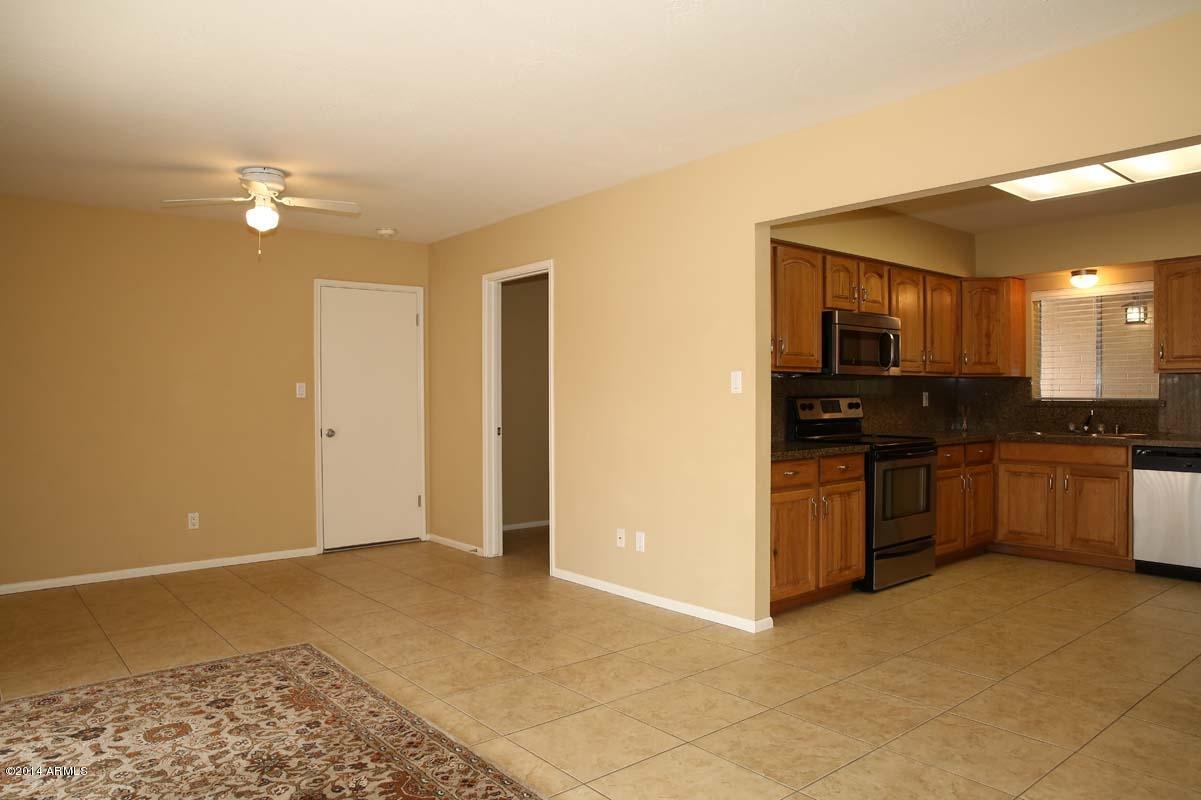 8213 East Chaparral Road Scottsdale, AZ 85250 - Photo 9 of 30 Family Room-Kitchen