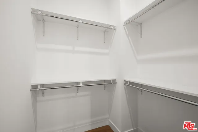 a view of an empty walk in closet