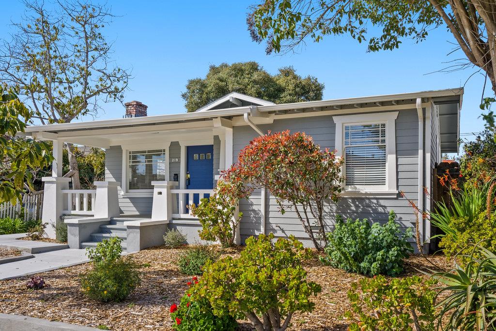 front view of a house with a small yard