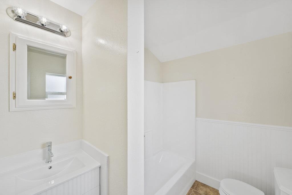 219-a Leonard Street Santa Cruz, CA 95060 - Photo 15 of 32 a bathroom with a sink a toilet and shower