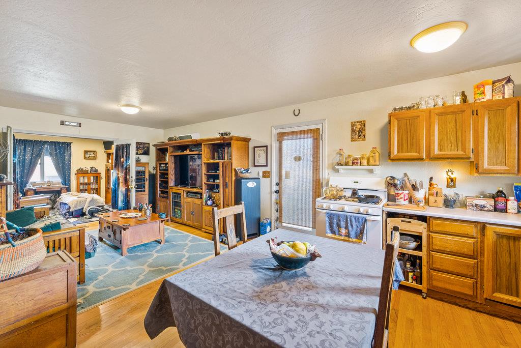 219-a Leonard Street Santa Cruz, CA 95060 - Photo 19 of 32 a living room with lots of furniture and clutter