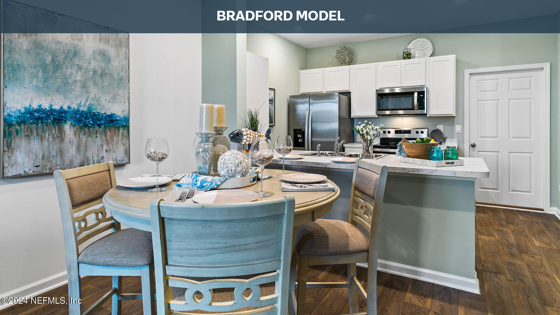 3523 Prairie Wind Court Middleburg, FL 32068 - Photo 11 of 30 a kitchen with a table chairs stove and microwave