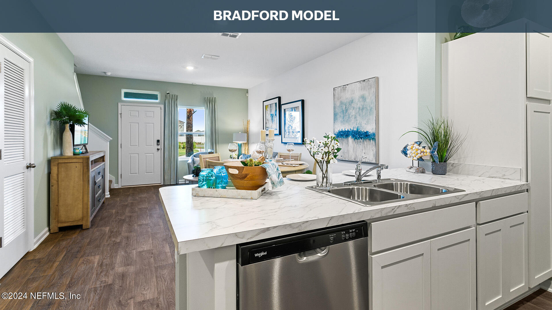 3523 Prairie Wind Court Middleburg, FL 32068 - Photo 15 of 30 a kitchen with sink and mirror