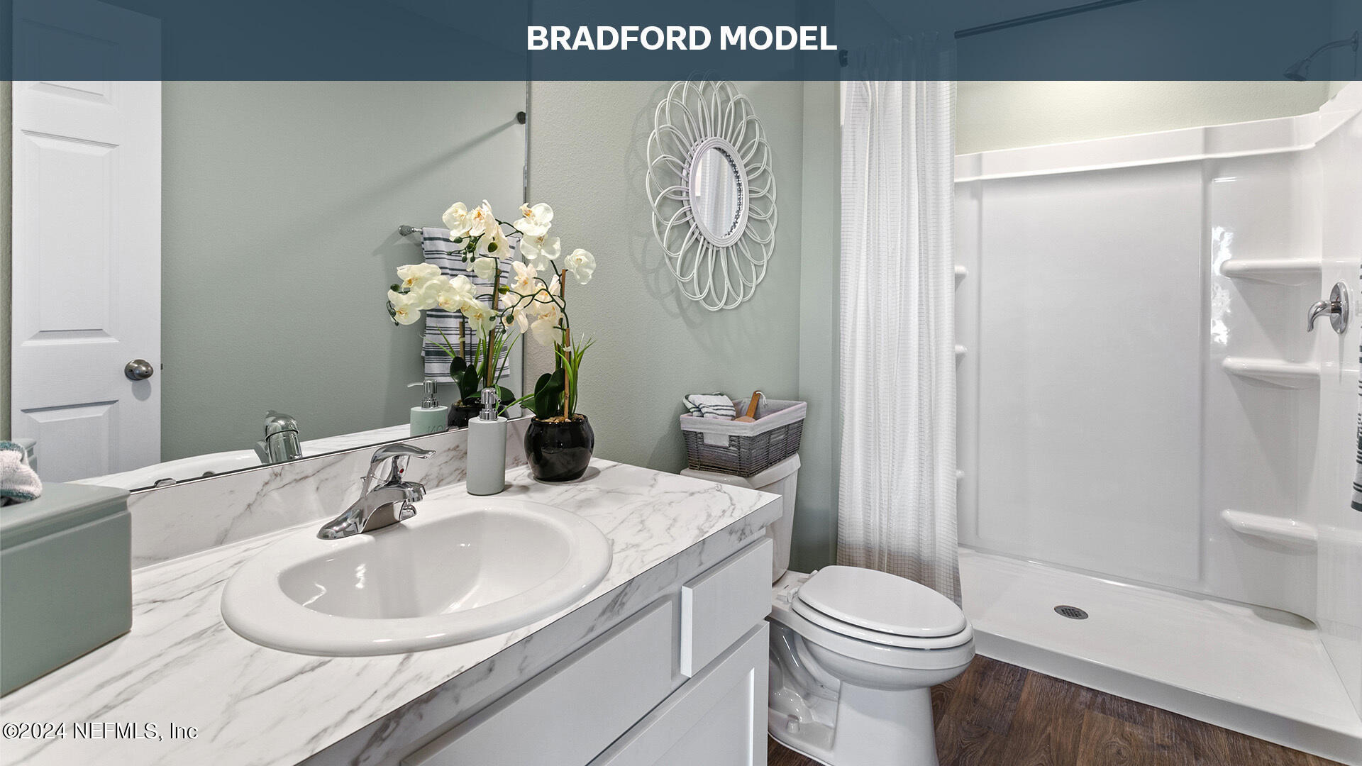 3523 Prairie Wind Court Middleburg, FL 32068 - Photo 16 of 30 a bathroom with a sink toilet and shower