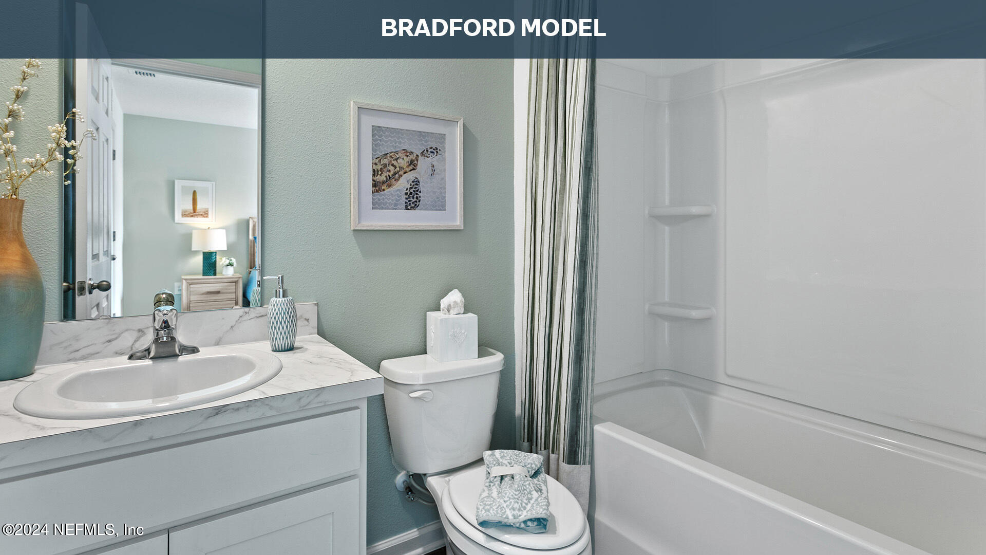 3523 Prairie Wind Court Middleburg, FL 32068 - Photo 18 of 30 a bathroom with a sink toilet and shower