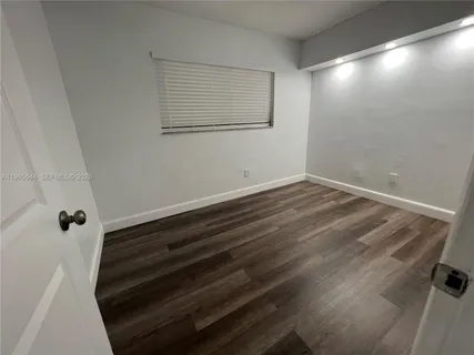 a view of small space with wooden floor