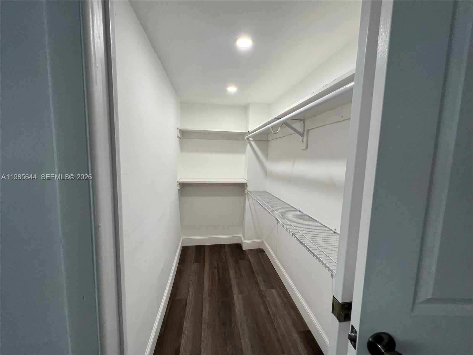 8635 Northwest 8th Street, Unit 211 Miami, FL 33126 - Photo 10 of 17 a view of walk in closet