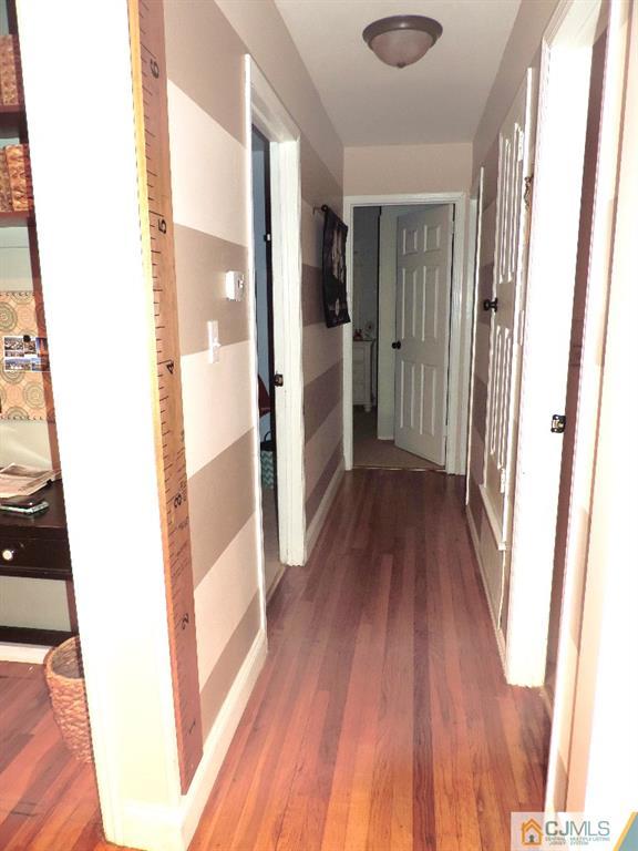 27 Columbia Road Old Bridge, NJ 08859 - Photo 11 of 24 a view of gallery with wooden floor