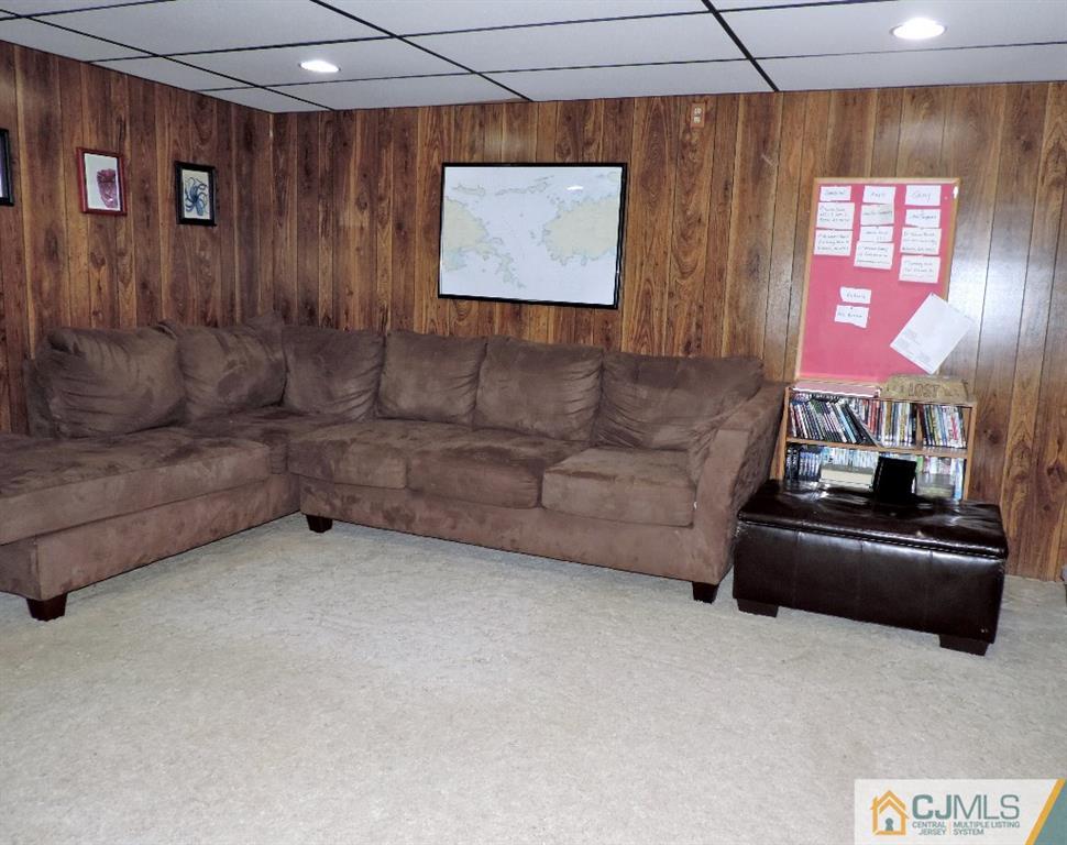 27 Columbia Road Old Bridge, NJ 08859 - Photo 17 of 24 a living room with furniture and a flat screen tv