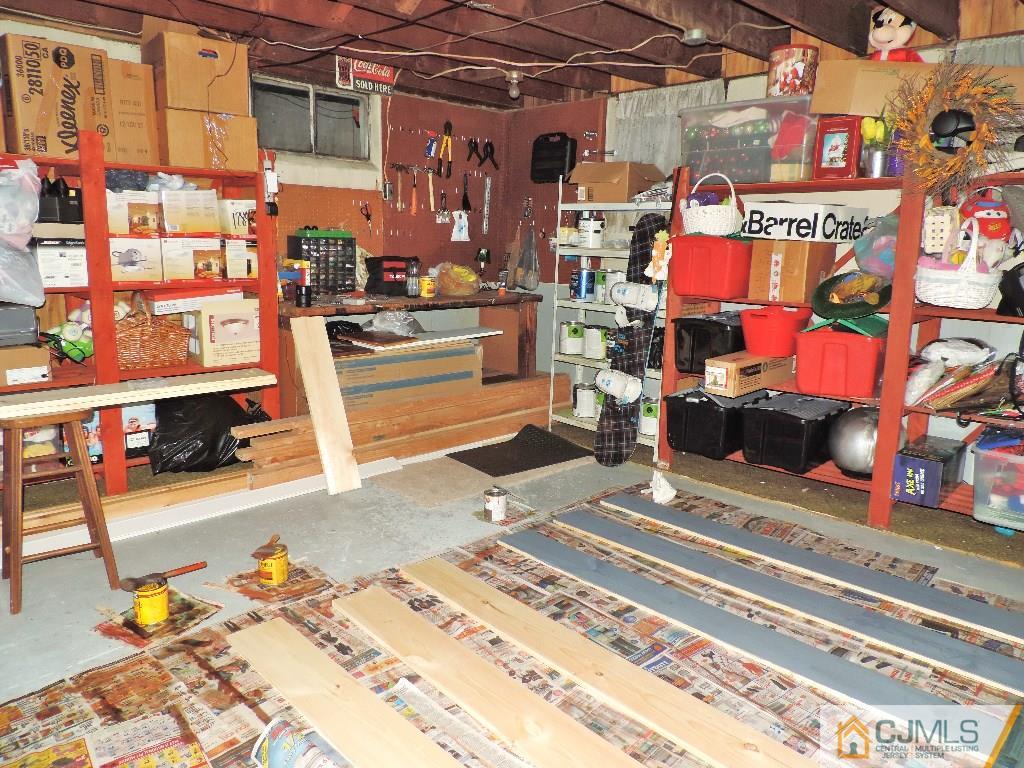 27 Columbia Road Old Bridge, NJ 08859 - Photo 19 of 24 a view of store room with racks