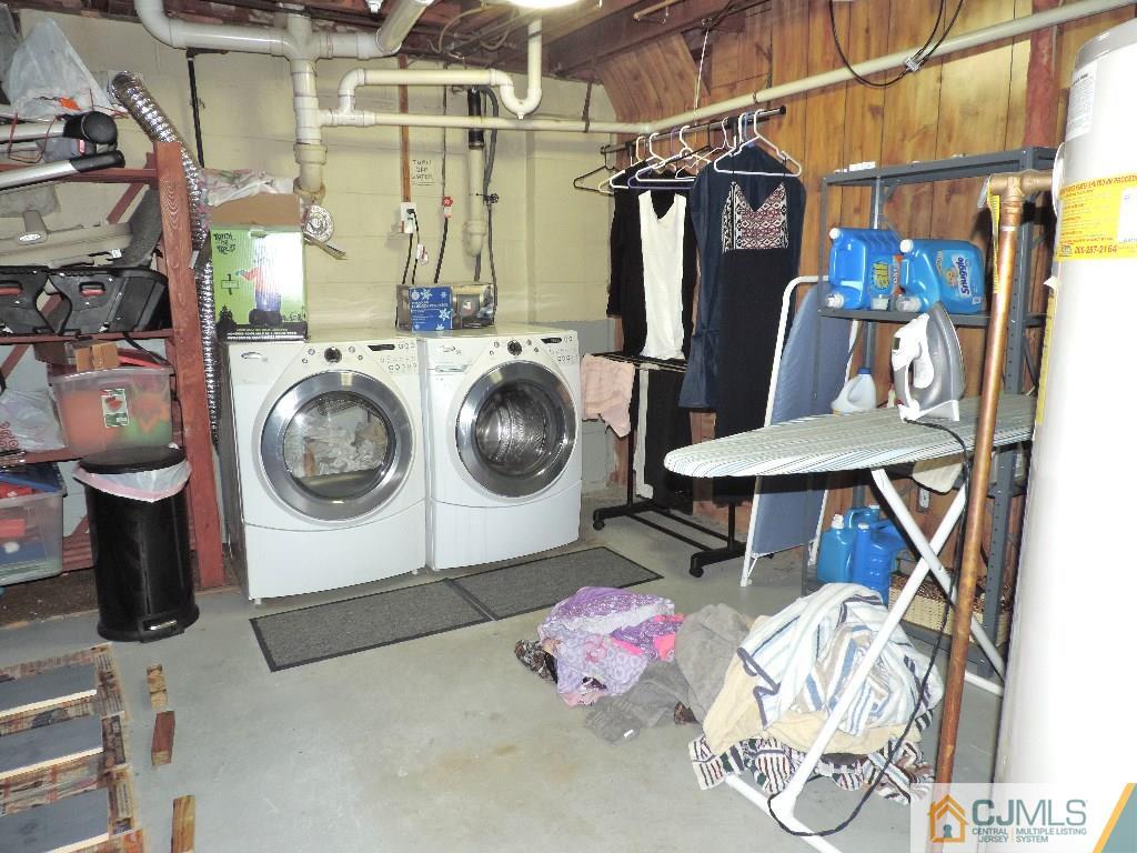27 Columbia Road Old Bridge, NJ 08859 - Photo 20 of 24 a utility room with dryer and washer