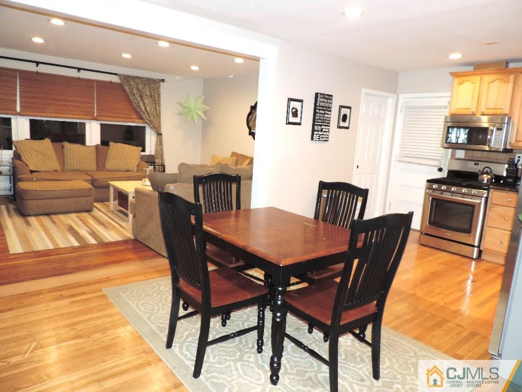 27 Columbia Road Old Bridge, NJ 08859 - Photo 7 of 24 a view of a dining room with furniture and a kitchen