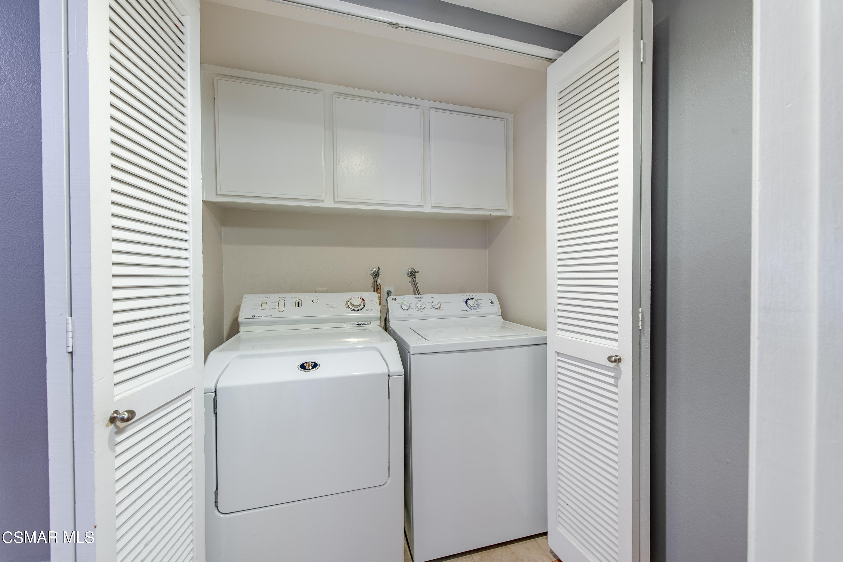 552 Spring Road, Unit 87 Moorpark, CA 93021 - Photo 24 of 29 a utility room with dryer and washer