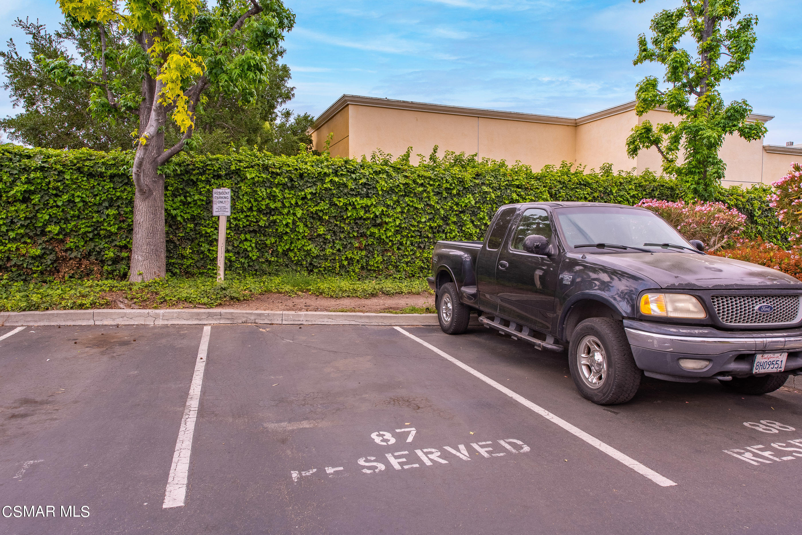 552 Spring Road, Unit 87 Moorpark, CA 93021 - Photo 29 of 29 a car parked in front of a house