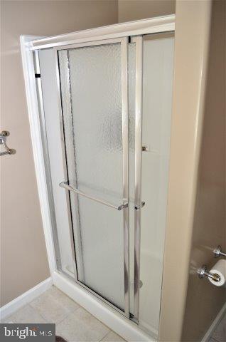 77 Sandyhook Road Ocean Pines, MD 21811 - Photo 16 of 31 a bathroom with a glass door shower