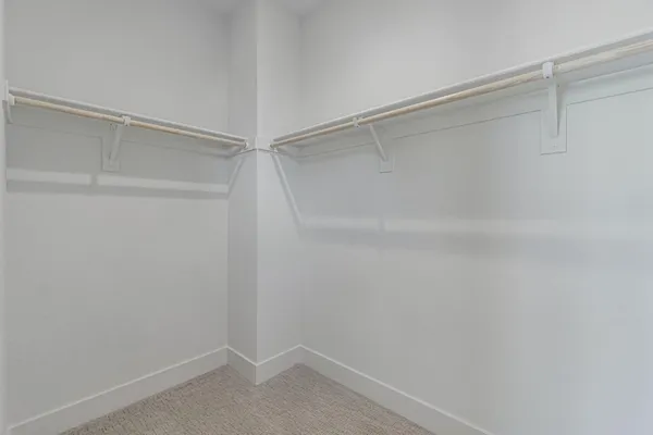a view of an empty walk in closet
