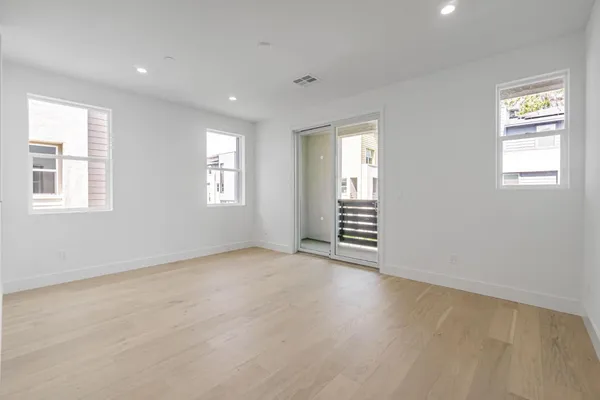 an empty room with windows