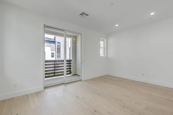 an empty room with windows